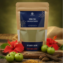 Load image into Gallery viewer, Herbal Thali hair wash powder package with green fruits and flowers on a rustic background