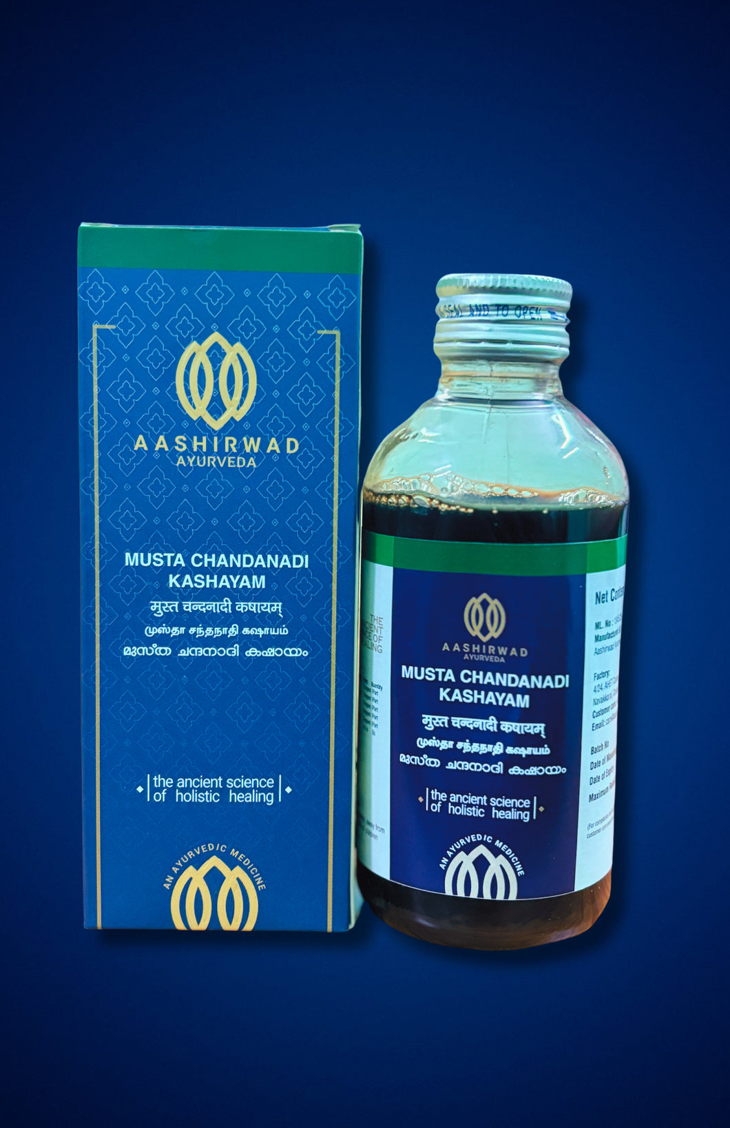 Aashirwad Ayurvedic bottle and box of Musta Chandanadi Kashayam on a blue background